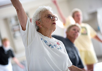 Elderly group exercising