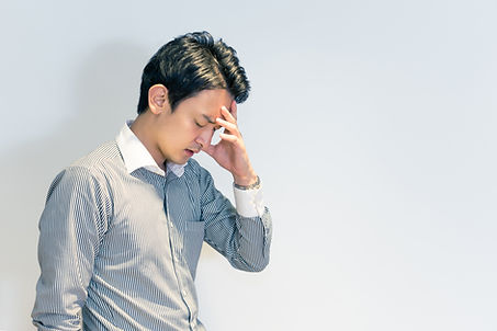 痛みに悩む男性