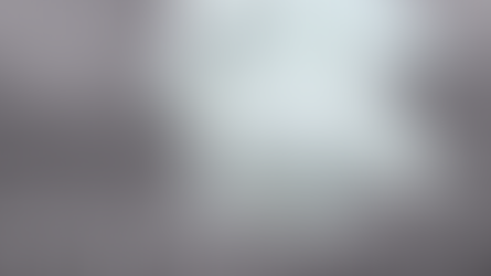 A plastic bag tumbling in the middle of the roadway