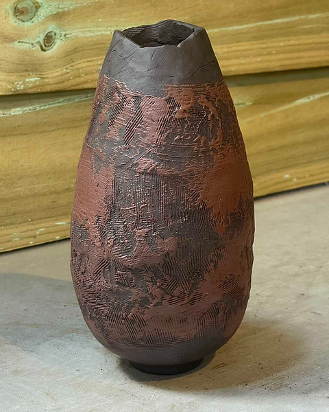 BLACK IRON FOOTED VESSEL.jpeg