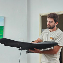 If you love him, let him fly! Uri with one of our 3d printed one wing airplane