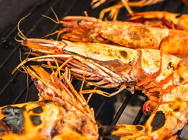 Prawns being cooked on a Kadai Firebowl
