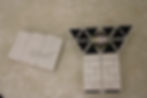 Brick parts of the model put out on a table.