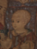 Portrait of a child in an ornate tapestry holding grapes. Background features intricate patterns with earthy tones, giving a serene mood.