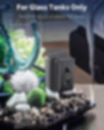 Magnetic aquarium brush cleaning algae from fish tank glass