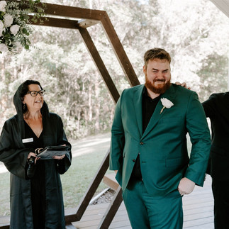 Emotional groom with groomsman and celebrant dressed as Jedi from Star Wars