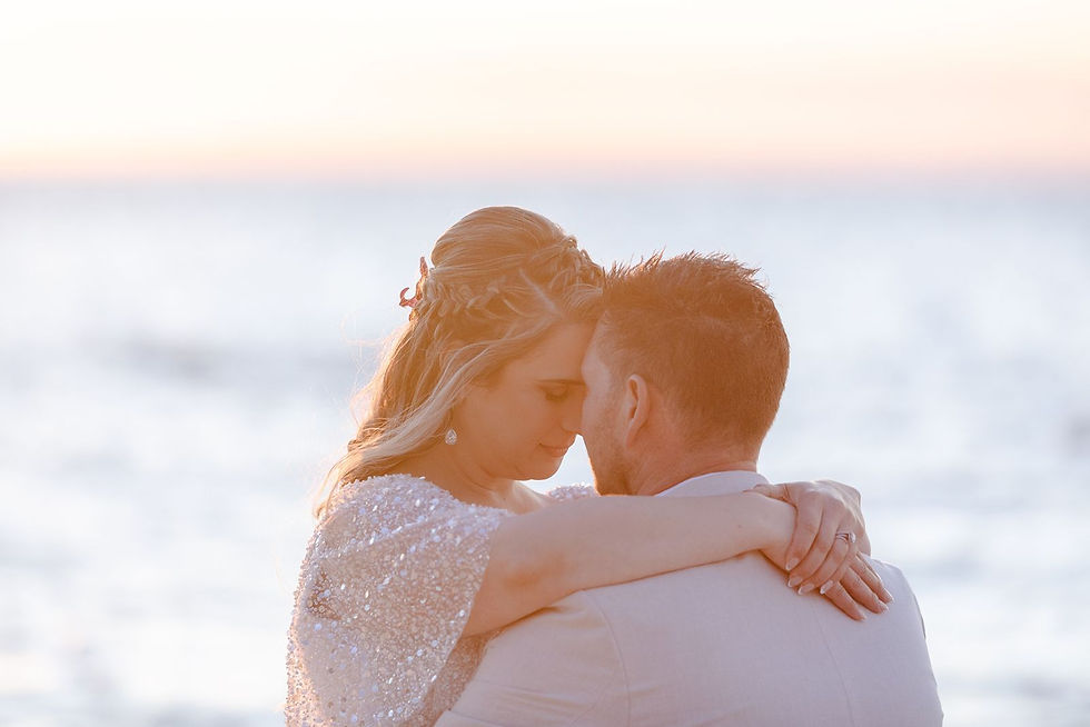 wedding couple sharing intimate moment after their personal wedding vows