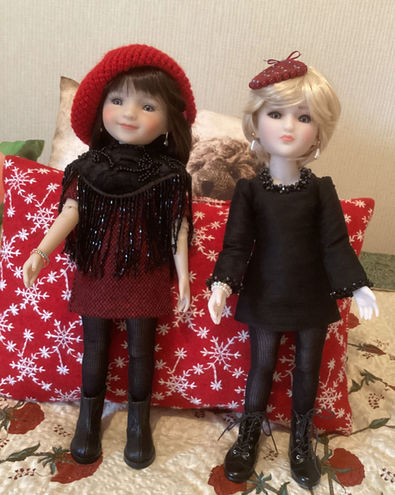 Dolls from Gisèle’s collection wearing Maison Méricourt haute couture outfits — detailed dresses, refined accessories, and Parisian elegance captured in soft, artistic lighting.