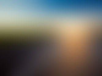 A forward arrow painted on a road leading to the sun, signifying a path to clarity.