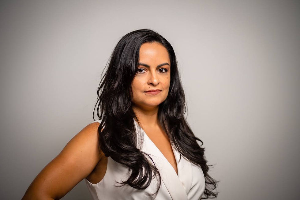 Professional portrait of Lydia Rodriguez-Llama, co-founder of the women’s rowing apparel company Llama Crew.