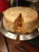 Tucci family timpano recipe as seen in Big Night with Stanley Tucci, golden-brown pasta drum made for Christmas at the Rachiele home