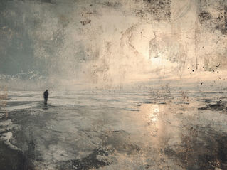 A solitary figure stands on the edge of a field of ice as the sun struggles to shine.