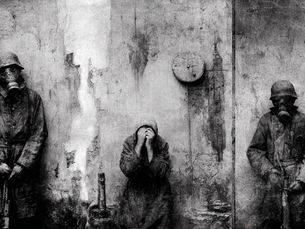Two men in gas masks with guns, one woman in agony.