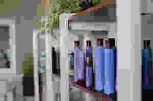 Hair products, like shampoo, line the salon shelves