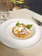 seafood dish in a white bowl