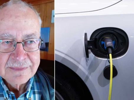 Tommy Österberg och elbil som laddar