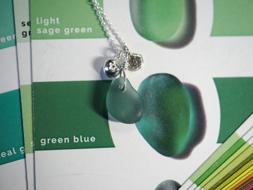 Thumbnail: Silver star pebble, silver crinoid fossil and sea glass cluster necklace