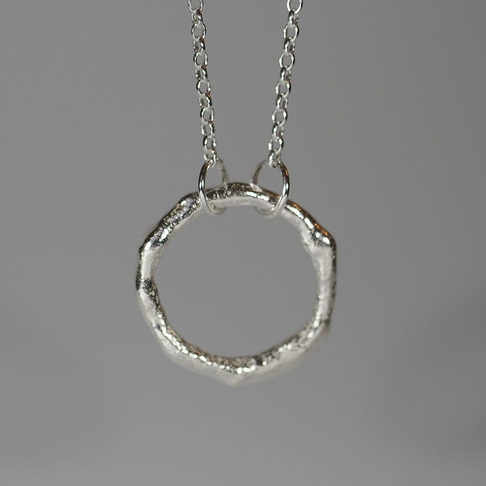 Thumbnail: Molten silver hoop necklace