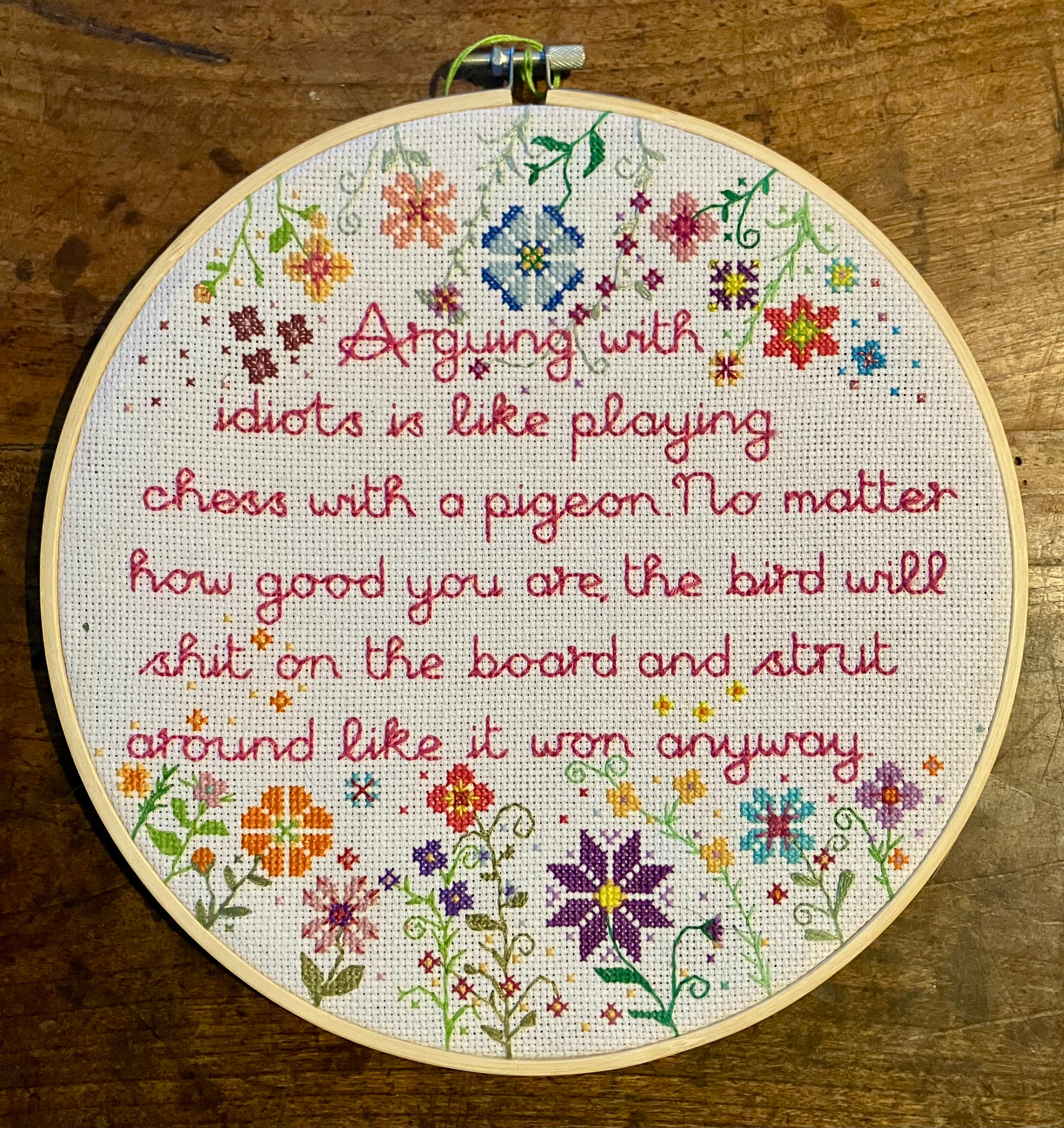 Arguing with idiots embroidery wall art