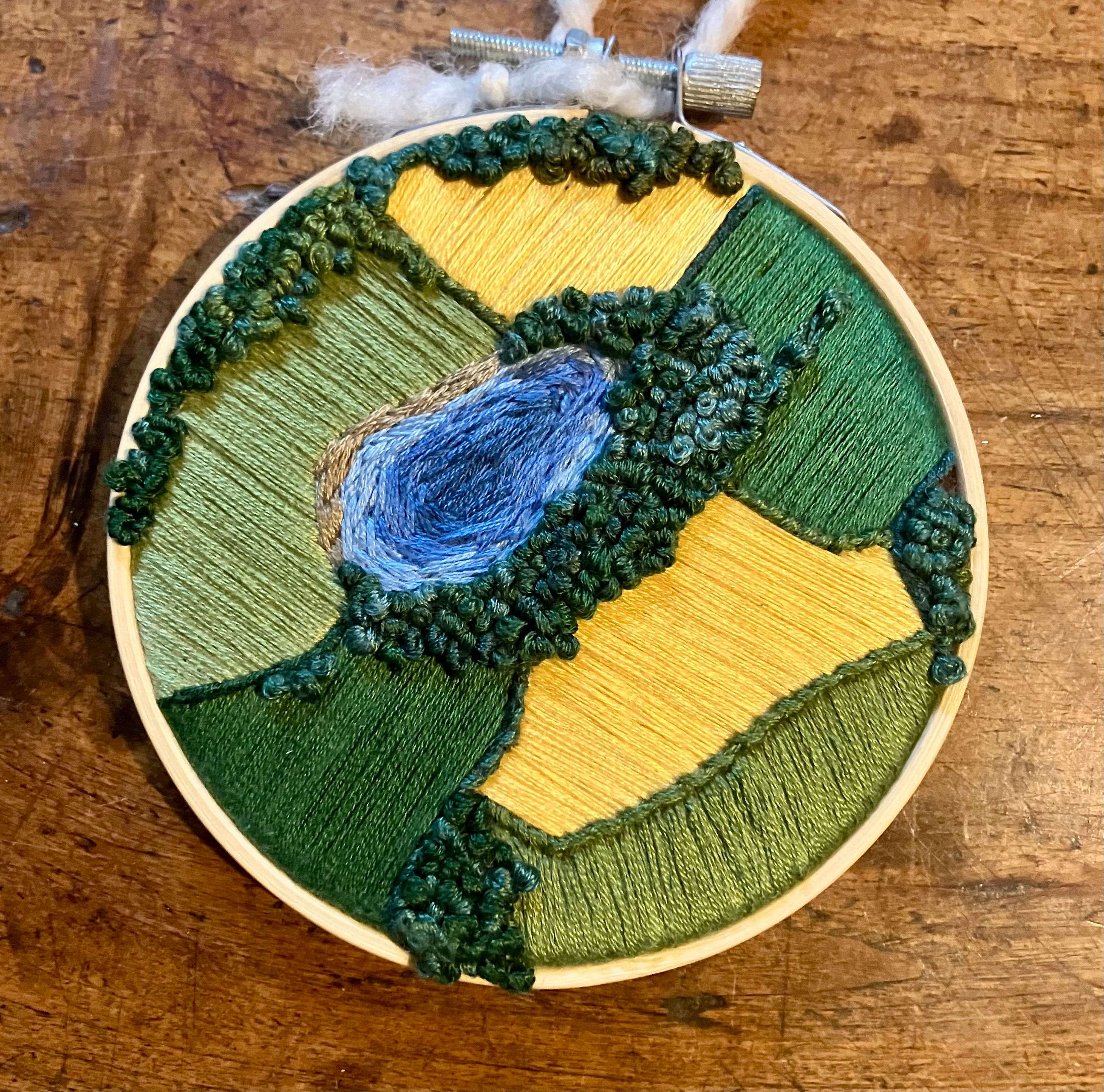 Bird's eye view embroidery wall art