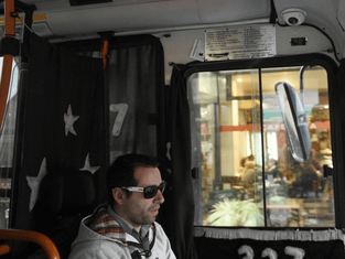 Eyes wide open in the bus