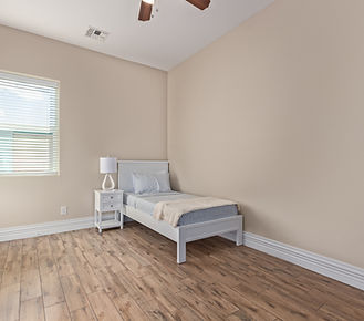 Bedroom shown at Abundant Life Assisted Living and Senior Care.