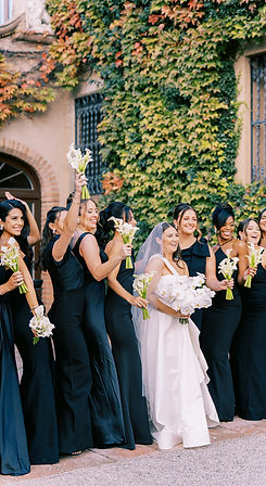 Bride and bridesmaids in navy dresses