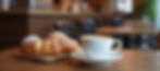 A-cozy-blue angel cafe-scene-featuring-coffee-pastries-and-blurred.jpg