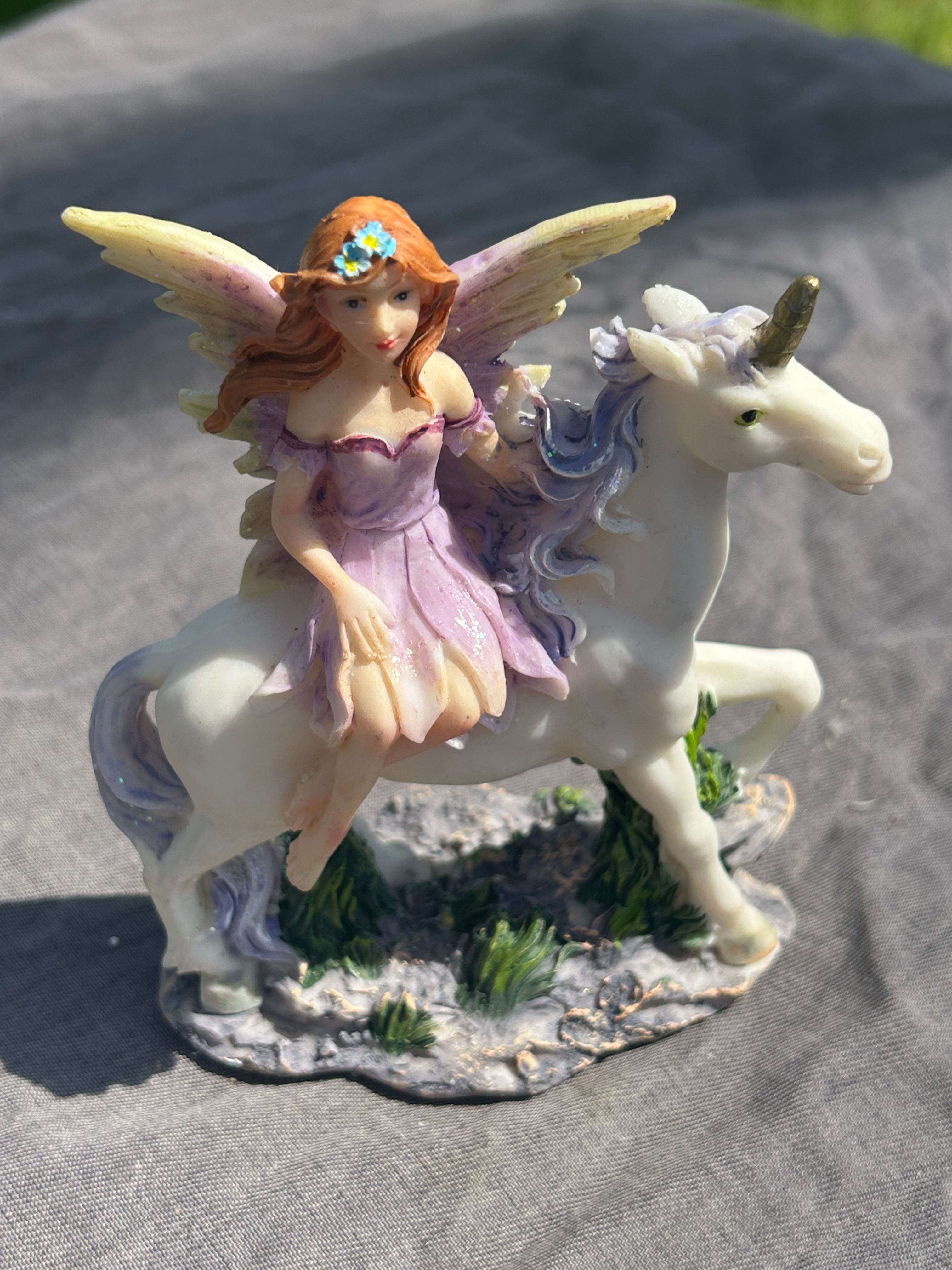 Purple Fairy Riding Unicorn