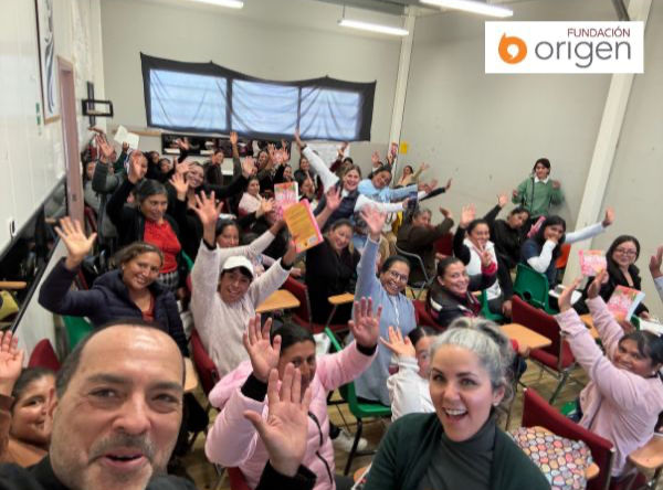 The Authors with a group at Fundación Origen workshop.