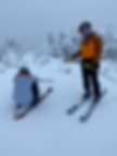 Couple skiing at Sugarbush Resort on overcast Winter afternoon