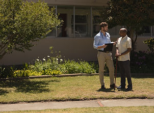 front-view-of-male-doctor-interacting-with-senior-2026-03-25-02-51-36-utc.jpg