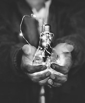 man holding incandescent bulb_edited.jpg