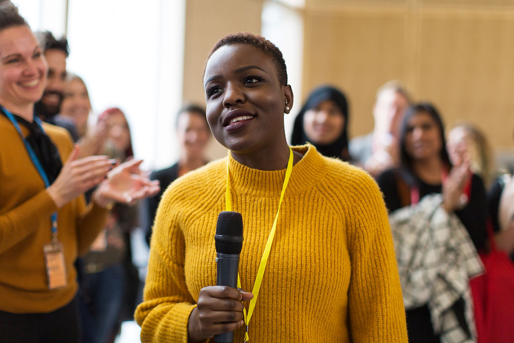 Woman speaking with microphone