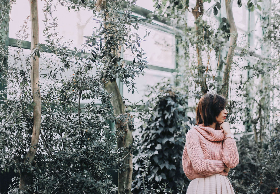 Woman in a Greenhouse