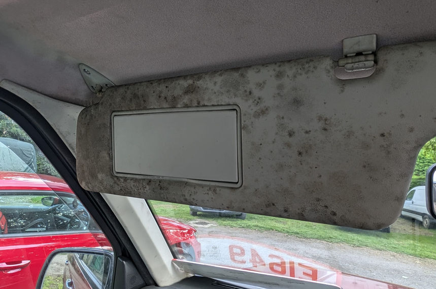 Neglected car interior before detailing in Gloucester – dirt, stains, and signs of long-term wear