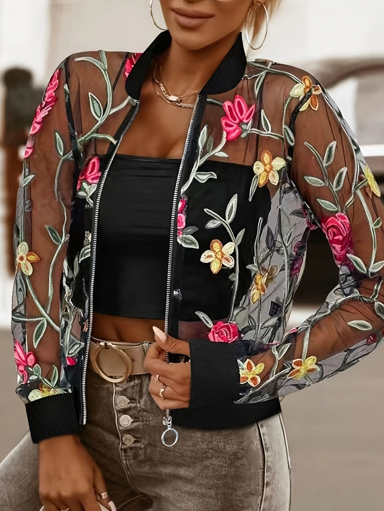 Model wearing Women’s Floral Embroidered Jacket with black crop top