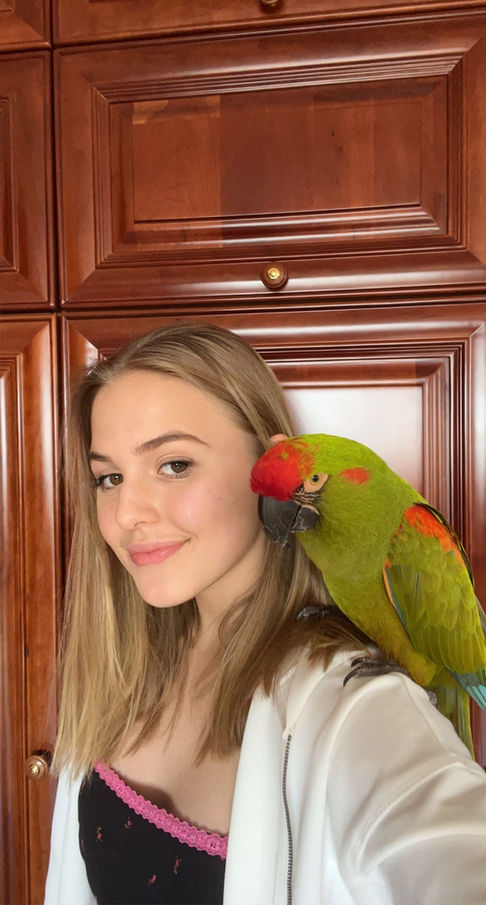 Emily Linge with her parrot Rocky