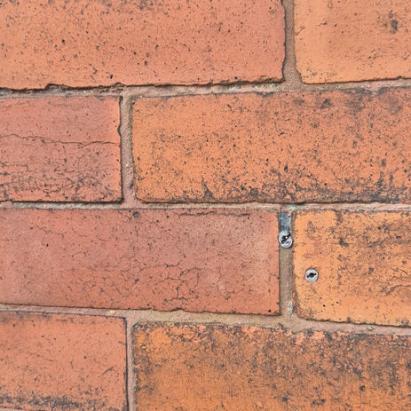 old mortar in bricks damaged