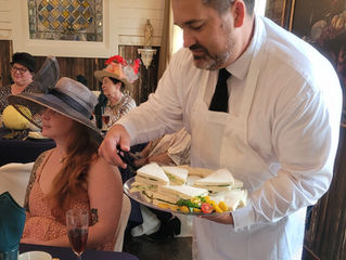 Who says the Consigliere doesn't work hard around here?!? Here's our hero making sure the world is safe for white bread sammiches! I love Samantha's super classy hat look here! First tea for her!