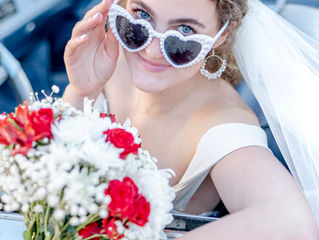 Are we not having a major cuteness overload alert here? We didn't realize until I studied this Storm Photo shot that our model bride's eyes were the PERFECT shade of blue for the Eldorado drop top!