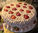 Now this cake says, "Let's have fun!". Really unique and very pretty cake that tasted very good and unusual for a wedding! Strawberries and cake throughout, with complexity. New flavor was great!