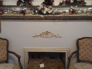 Stuffed snowman party on the top with the thankfulness creche cradle down below. The perfect touch!