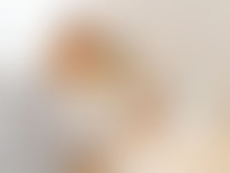 Senior woman painting in her home