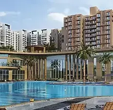 bptp-gaia-residences-sector-102-gurugram-pool-clubhouse-view.webp