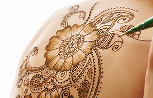 Henna Back Tattoo