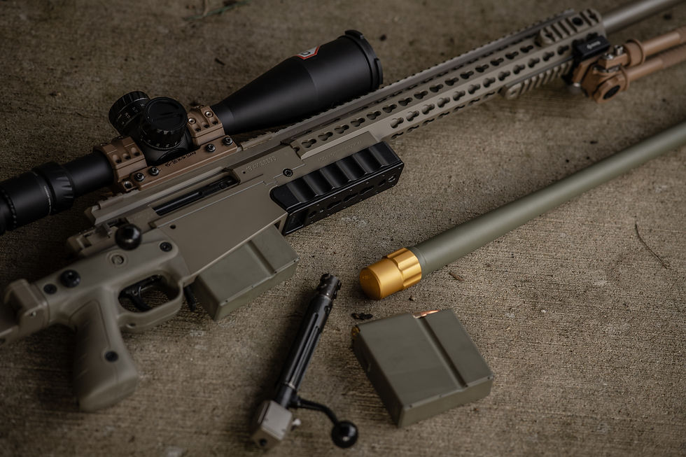 Acuuracy International Gun with bolt out and extra barrel