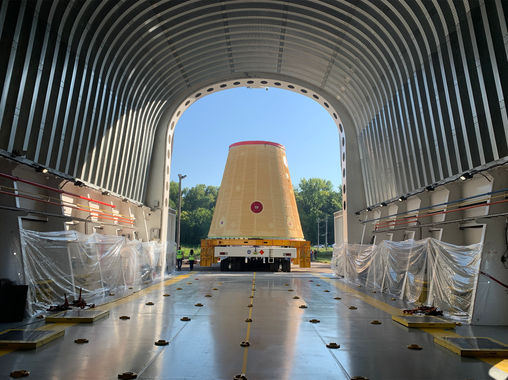 NASA Teams Load Artemis I Rocket Hardware on Barge for Trip to Kennedy