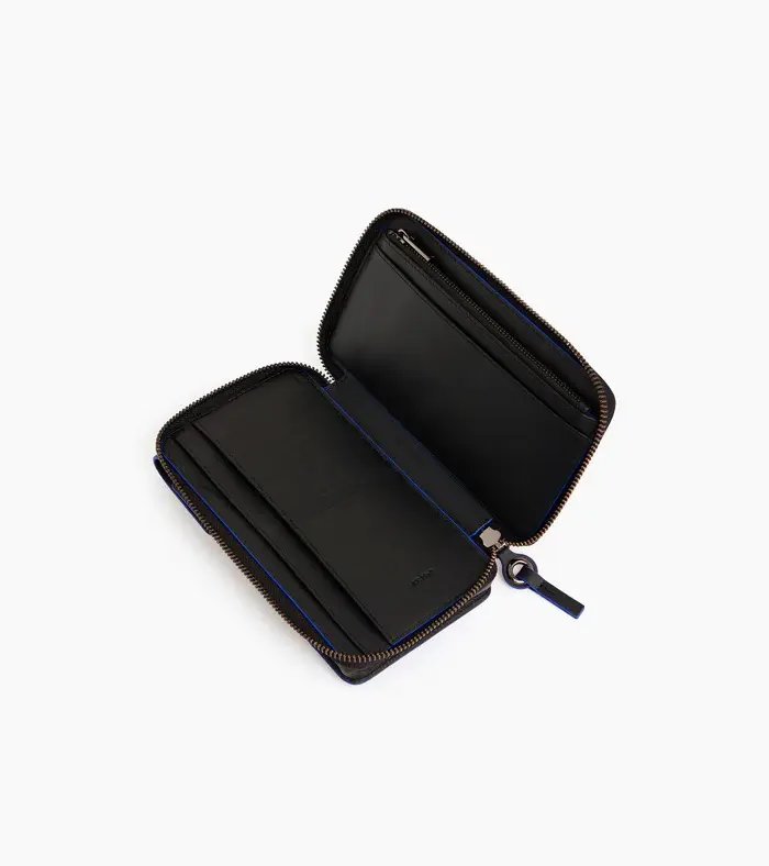 Miniature : Pochette téléphone Le Tanneur Alexis tour de cou en cuir grainé noir et bleu