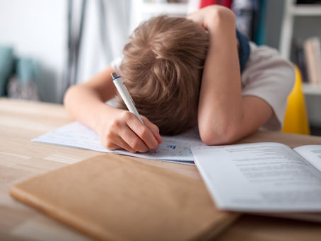 Boy struggling with writing